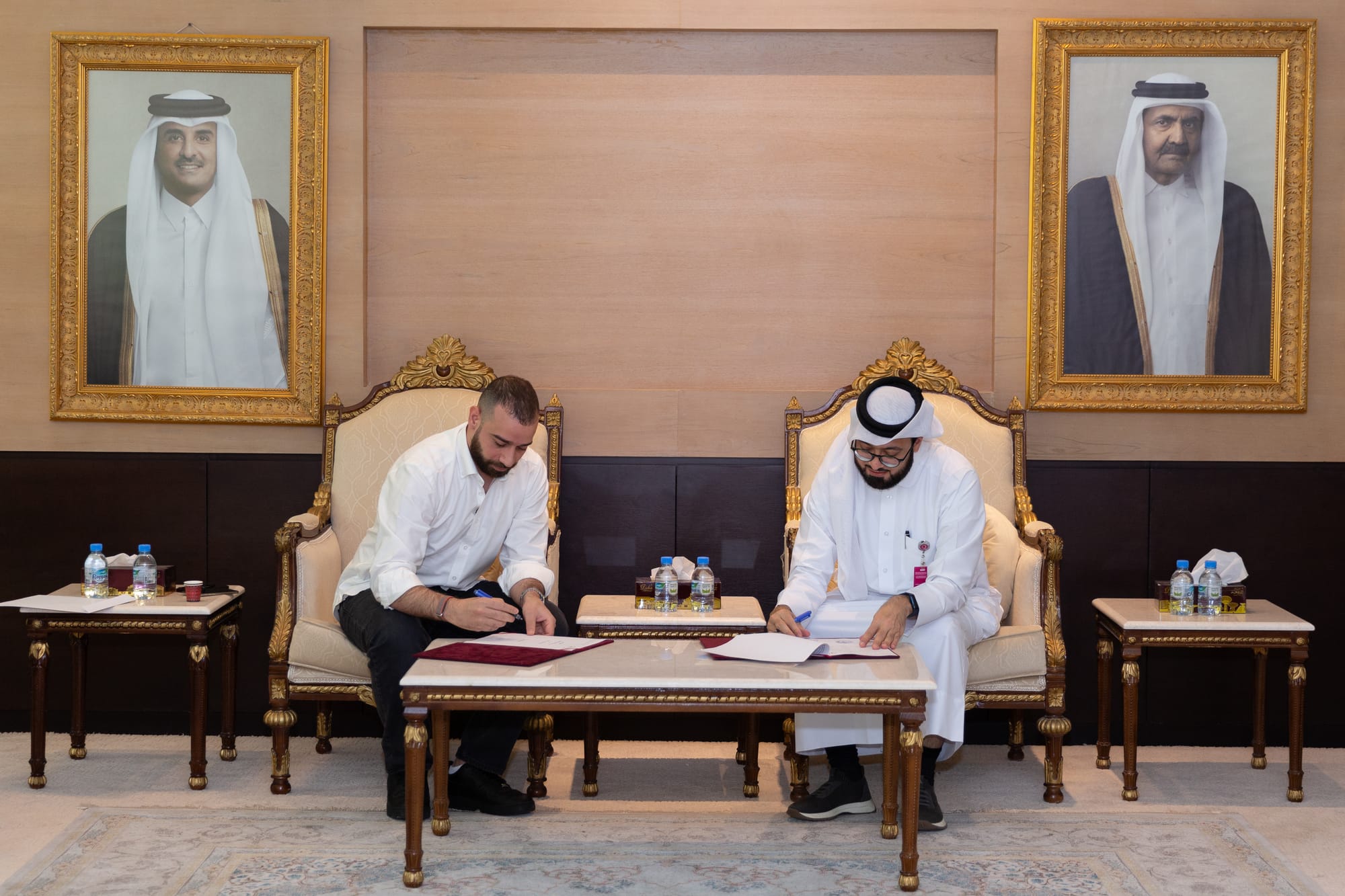توقيع اتفاقية التعاون بين وولف ستور وقطر الخيرية